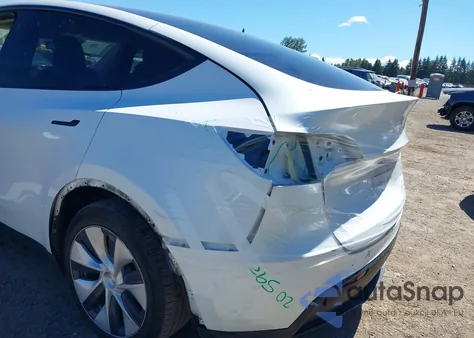 2023 Tesla Model Y Awd/Long Range Dual Motor All-Wheel Drive z USA, uszkodzony, nr VIN 7SAYGAEE1PF700262